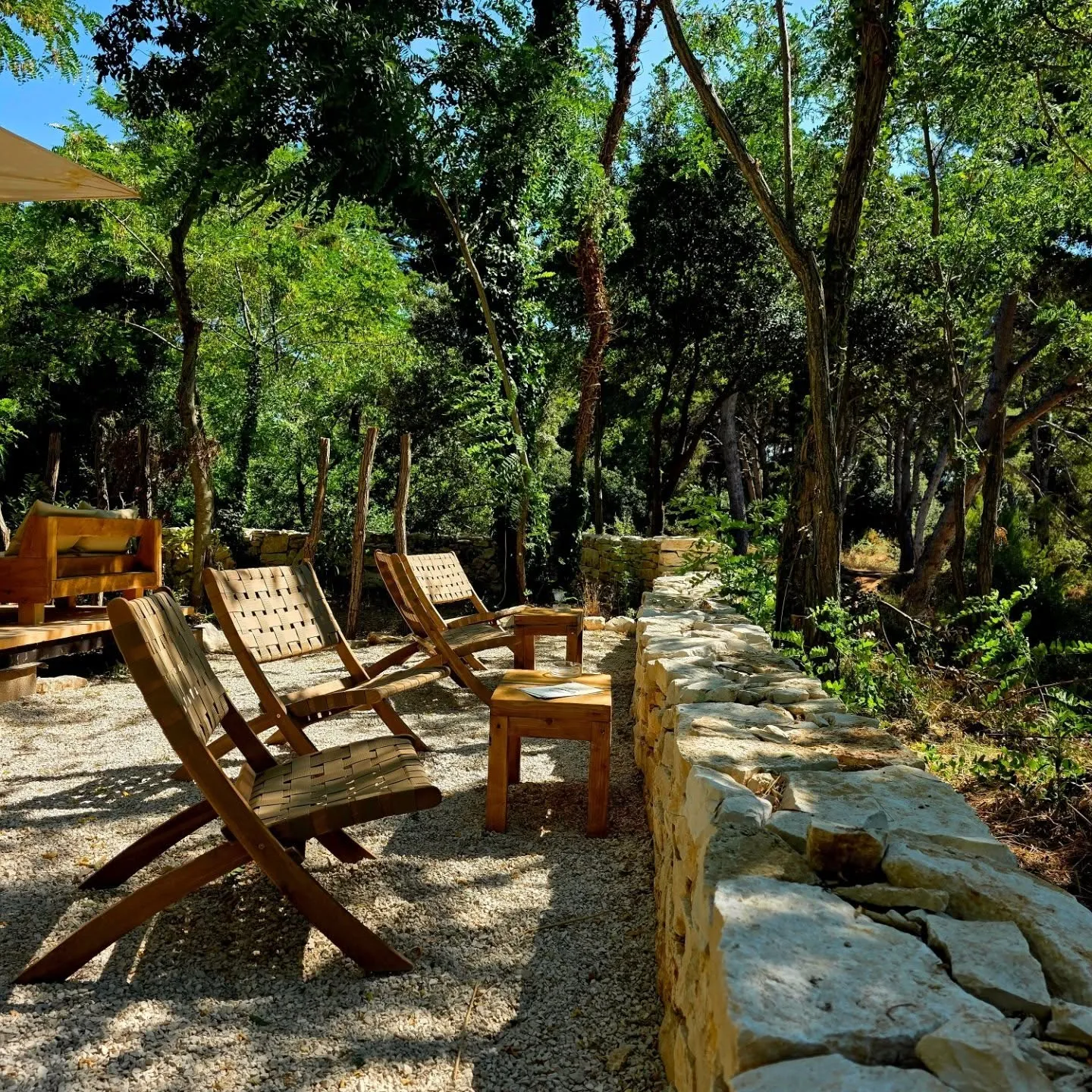 Deck chairs by the stone wall